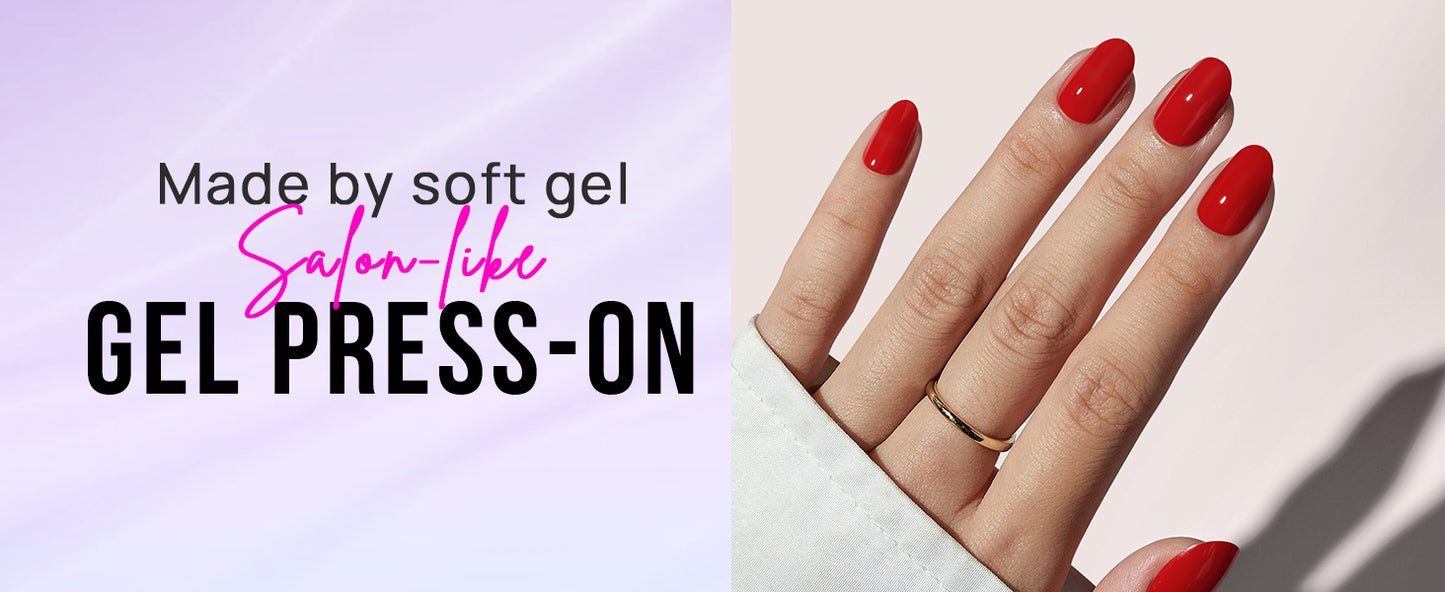 Hand with red nail polish wearing gel press-ons on a light background