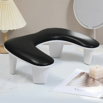 Grey This handheld nail care device integrates a U-shaped pillow and comes with a portable detachable stand. Designed with an inclined PU material and a sturdy base, it is crafted for both comfort and portability. VXN Beauty