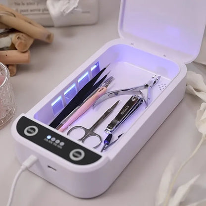 Portable Nail Disinfection Box, USB powered. Built‑in UV fast sterilization, suitable for nail and tattoo tools, PVC/plastic material, the ideal hygiene assistant for salons and studios. VXN Beauty