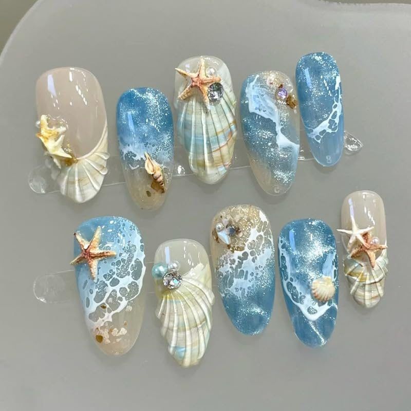 Blue seaside false nails, decorated false nails, seashell nail art, starfish nails, ocean-inspired nails, coastal nail designs, beach themed nails, Australian nail art VXN Beauty