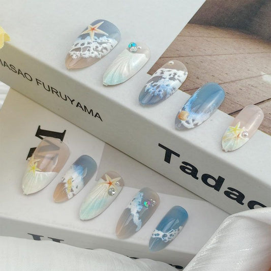 Blue seaside false nails, decorated false nails, seashell nail art, starfish nails, ocean-inspired nails, coastal nail designs, beach themed nails, Australian nail art VXN Beauty