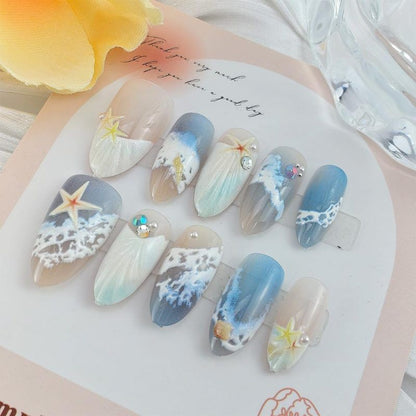 Blue seaside false nails, decorated false nails, seashell nail art, starfish nails, ocean-inspired nails, coastal nail designs, beach themed nails, Australian nail art VXN Beauty